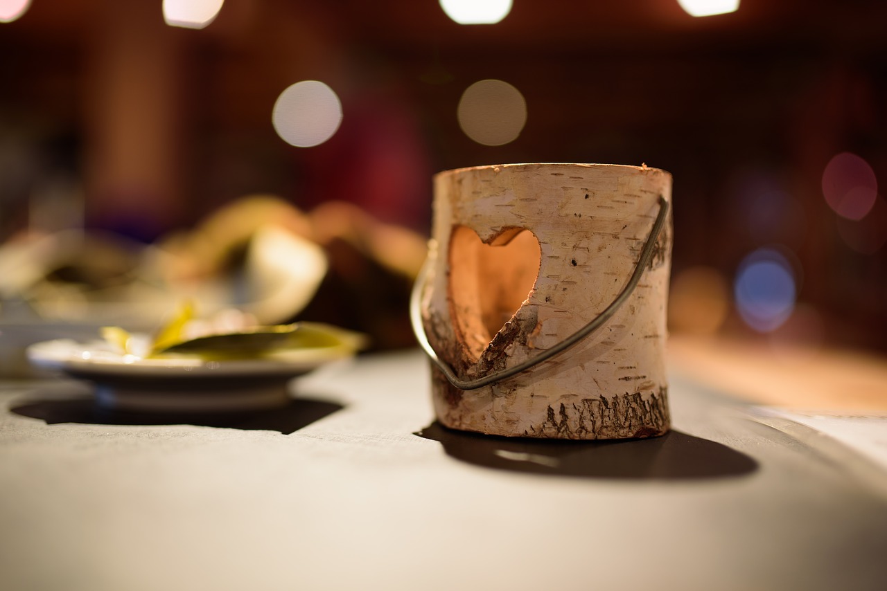 A heart-wood candle on a table