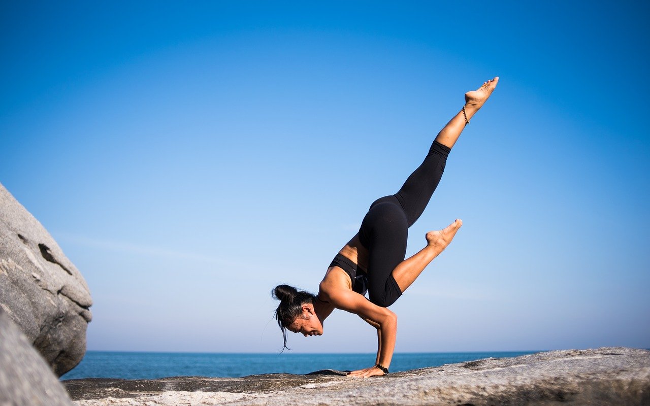 A woman doing yoga during Sedona AZ events
