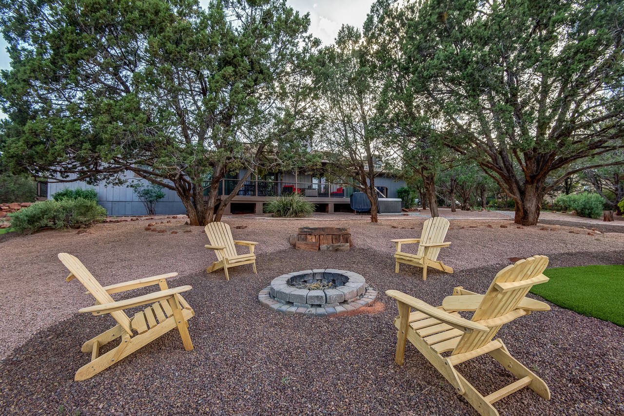 Chairs around a fireplace in our Sedona Vacation Home Rentals