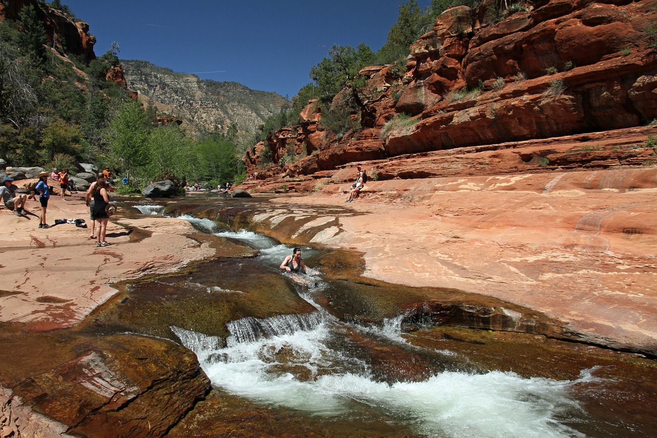 A bunch of people enjoying a river in Sedona