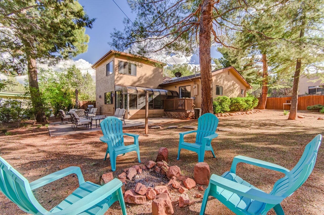 The back patio and firepit of a HomeAway Sedona rental