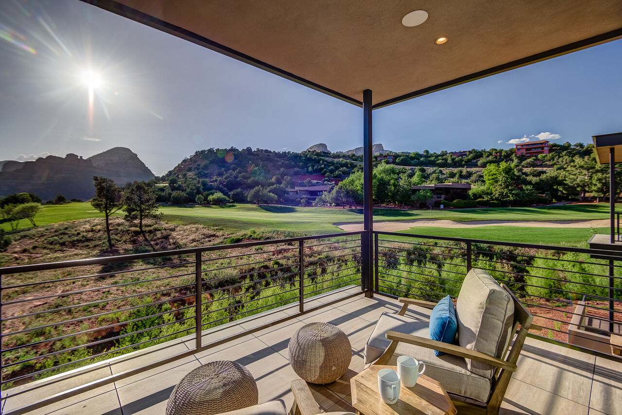 The patio of one of our homes to rent in Sedona AZ with golf course views
